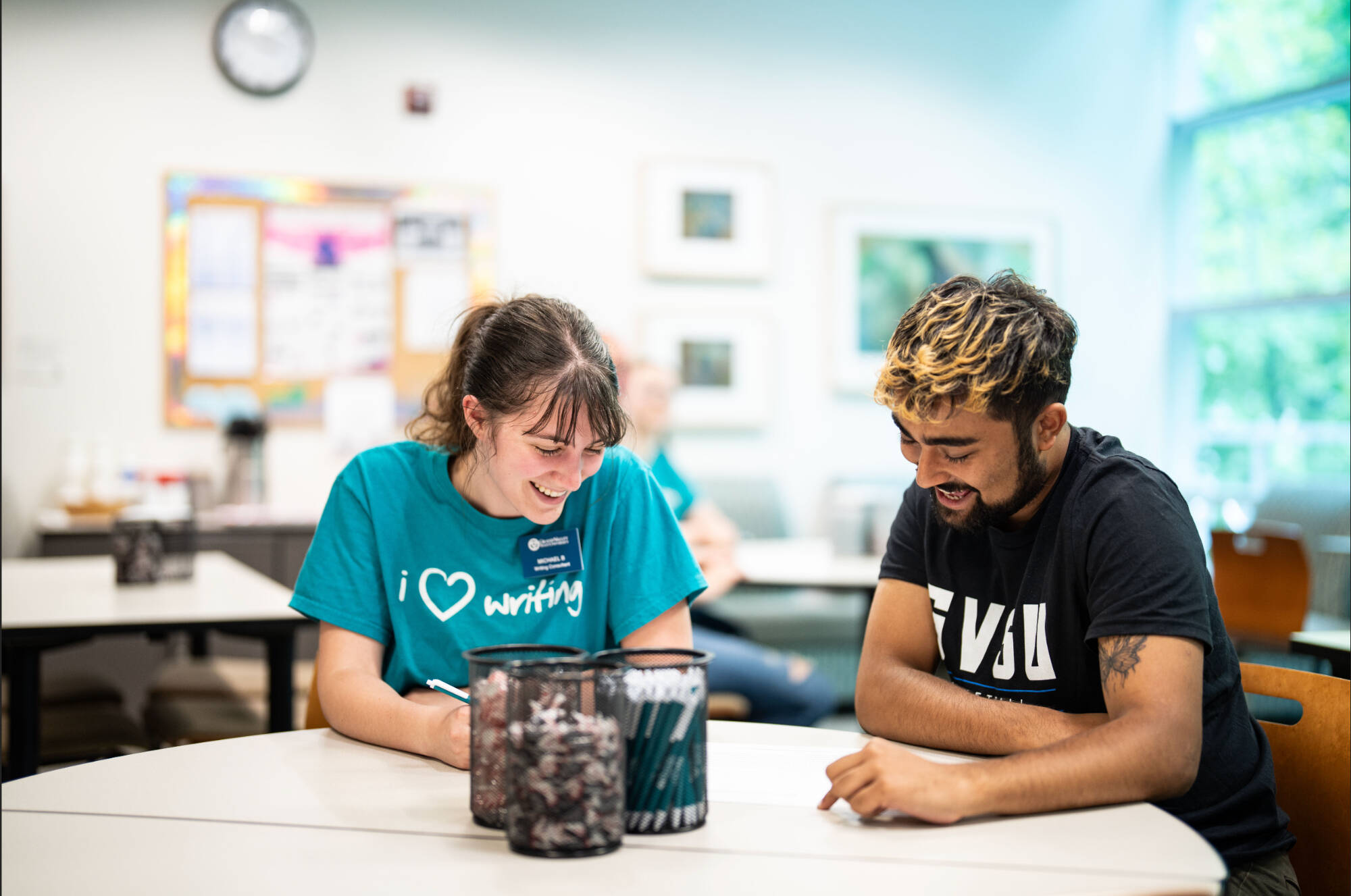 writing consultants assist students